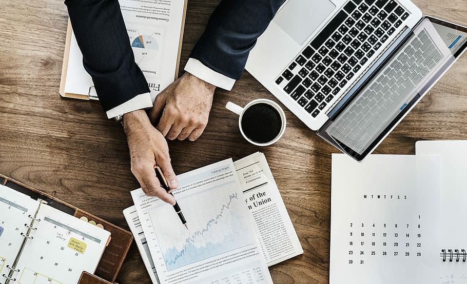 Business desk with documents and financial papers
